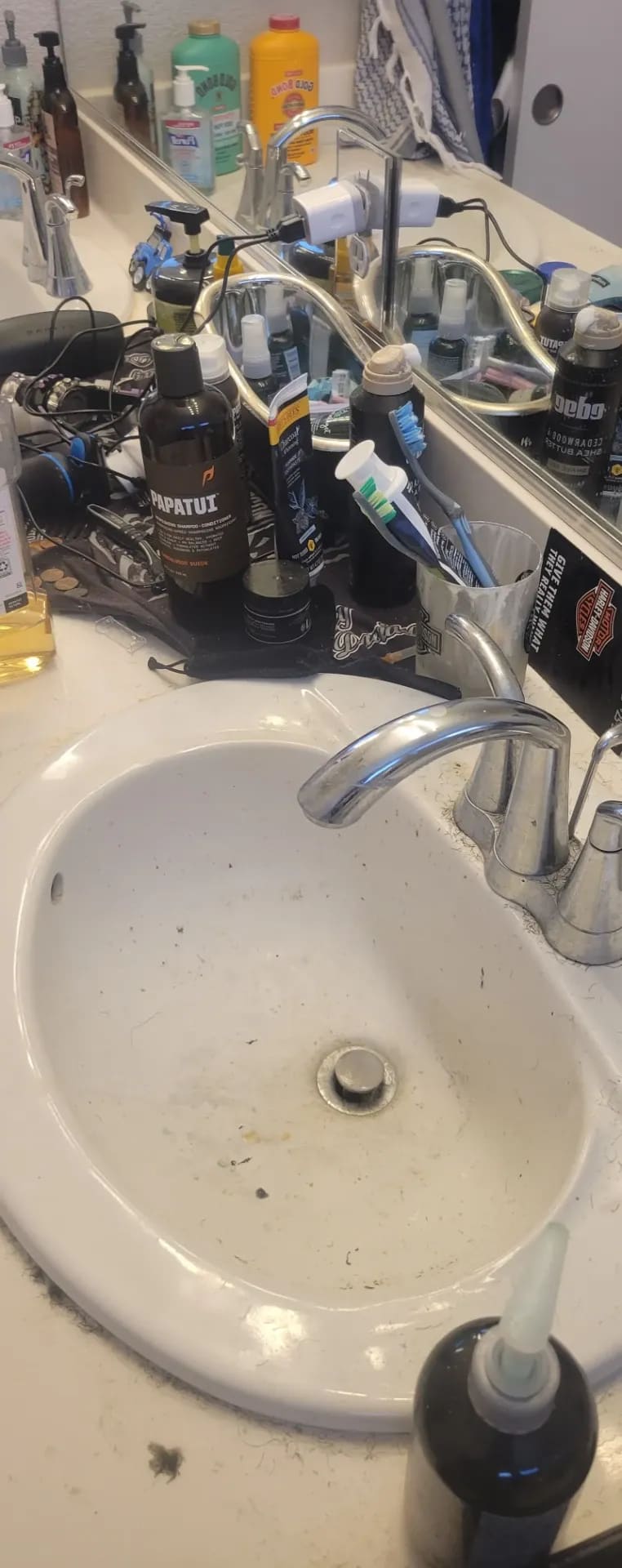 Bathroom sink before cleaning — grime and buildup