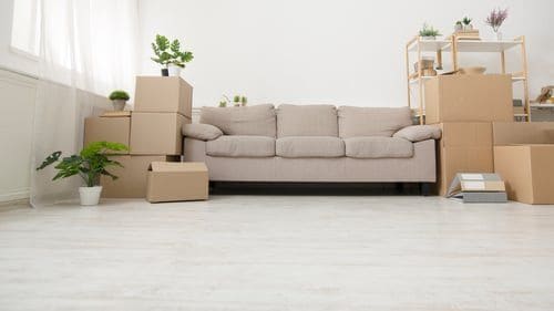 Empty Las Vegas living room with moving boxes prepared for a move in move out cleaning service