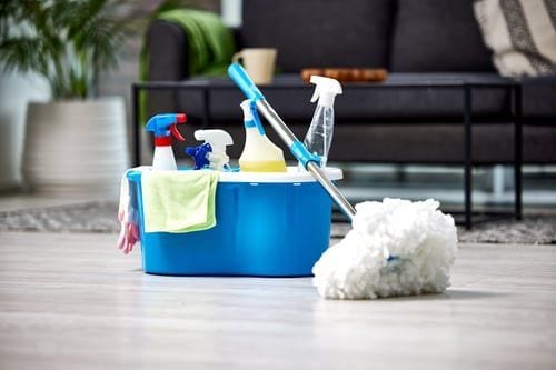 Commercial cleaner servicing a Las Vegas office workspace after business hours